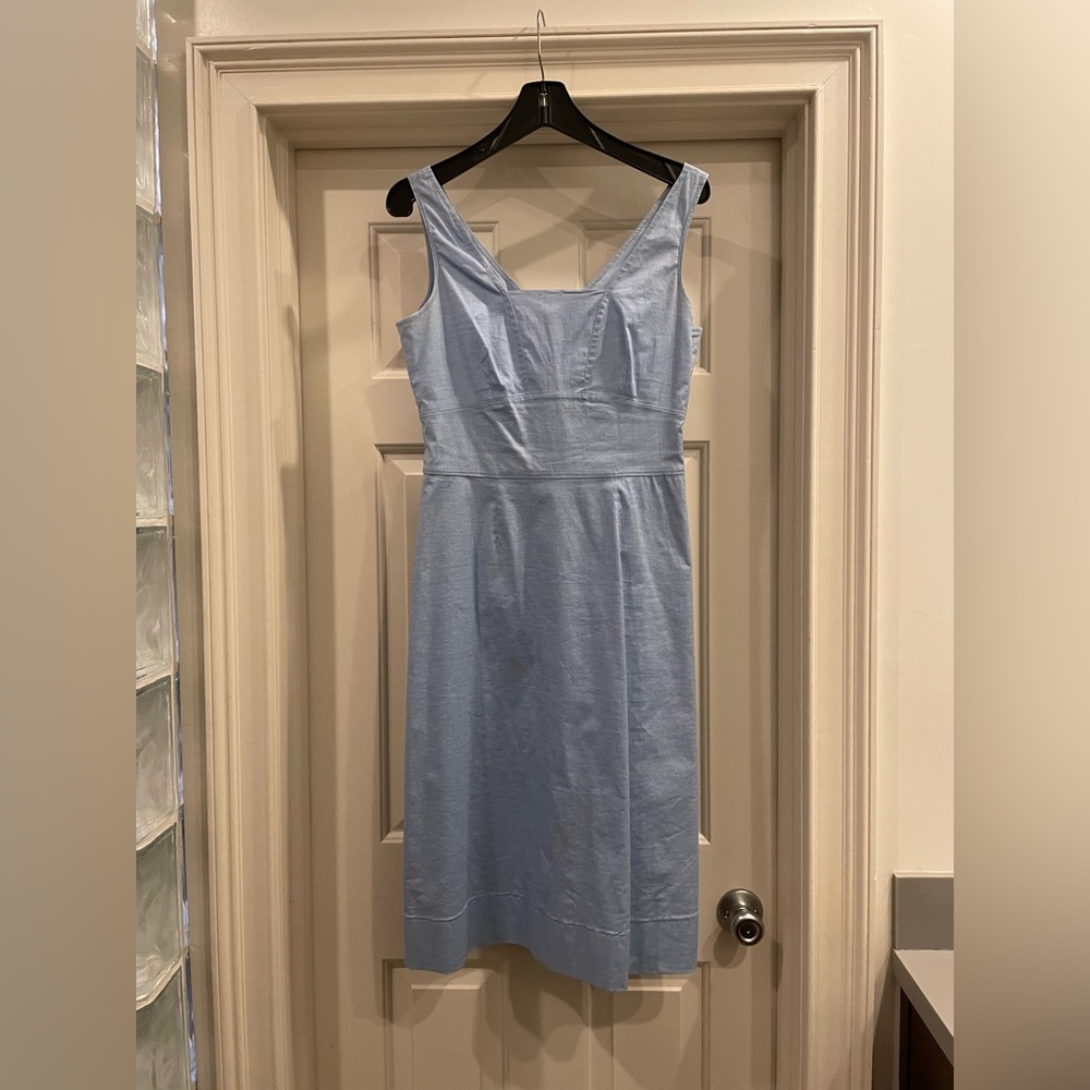 Sleeveless pale blue below-knee sundress